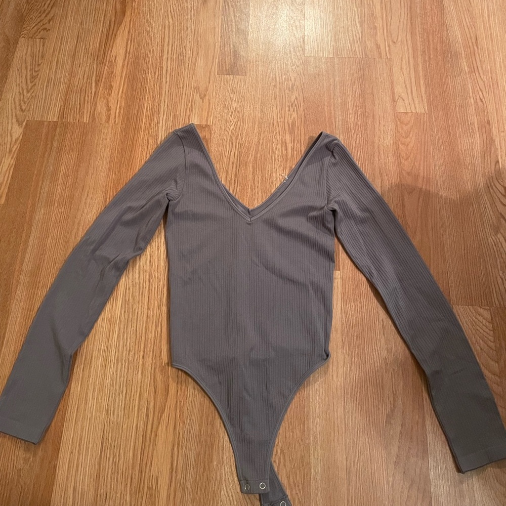 Light purple bodysuit worn once